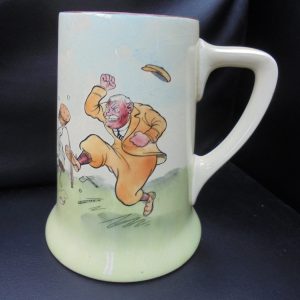 A Royal Doulton 'IRATE GOLFER' tankard by Henry Mayo Batemen. (Ref OCT 3271).