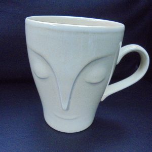 A Cadbury's BOURNVITA plastic mug.