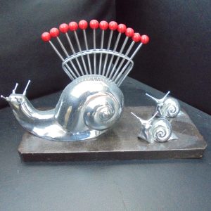 A set of 12 Escargot forks by Benjamin Rabier. (Ref OCT 3294).
